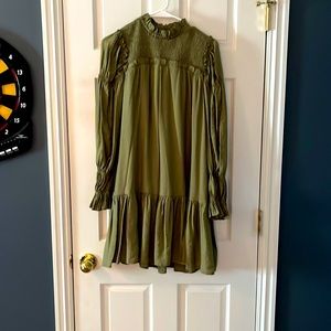 Long sleeve dress with light slip liner underneath.
